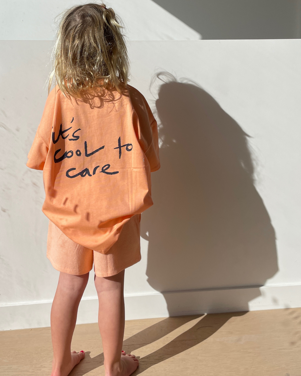 Tee | We Care - Sherbert