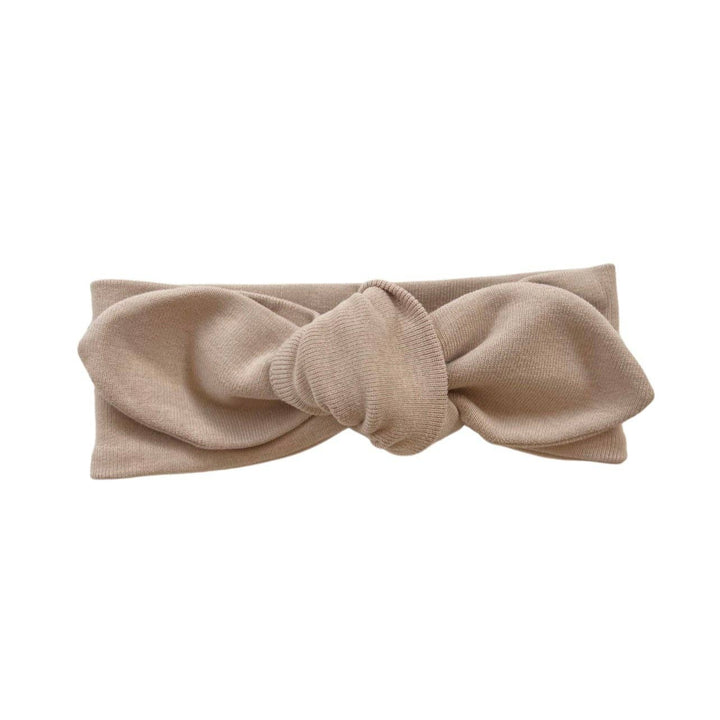 Beige headband with a bow 