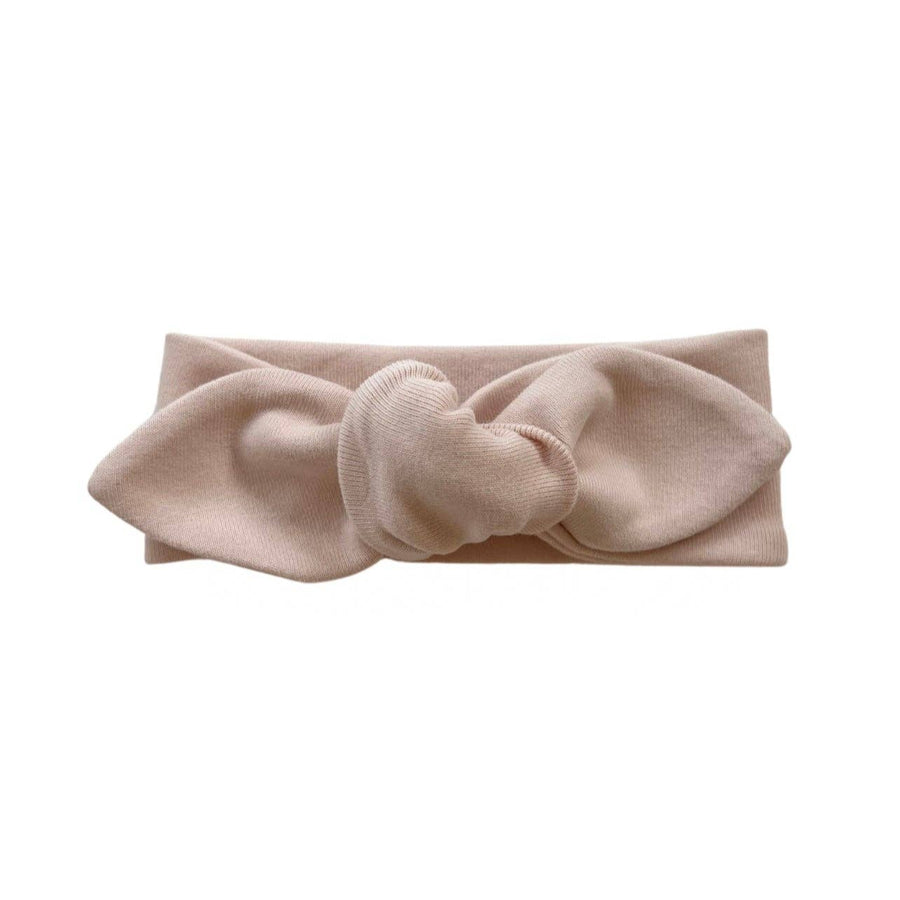 Beige headband with a bow 