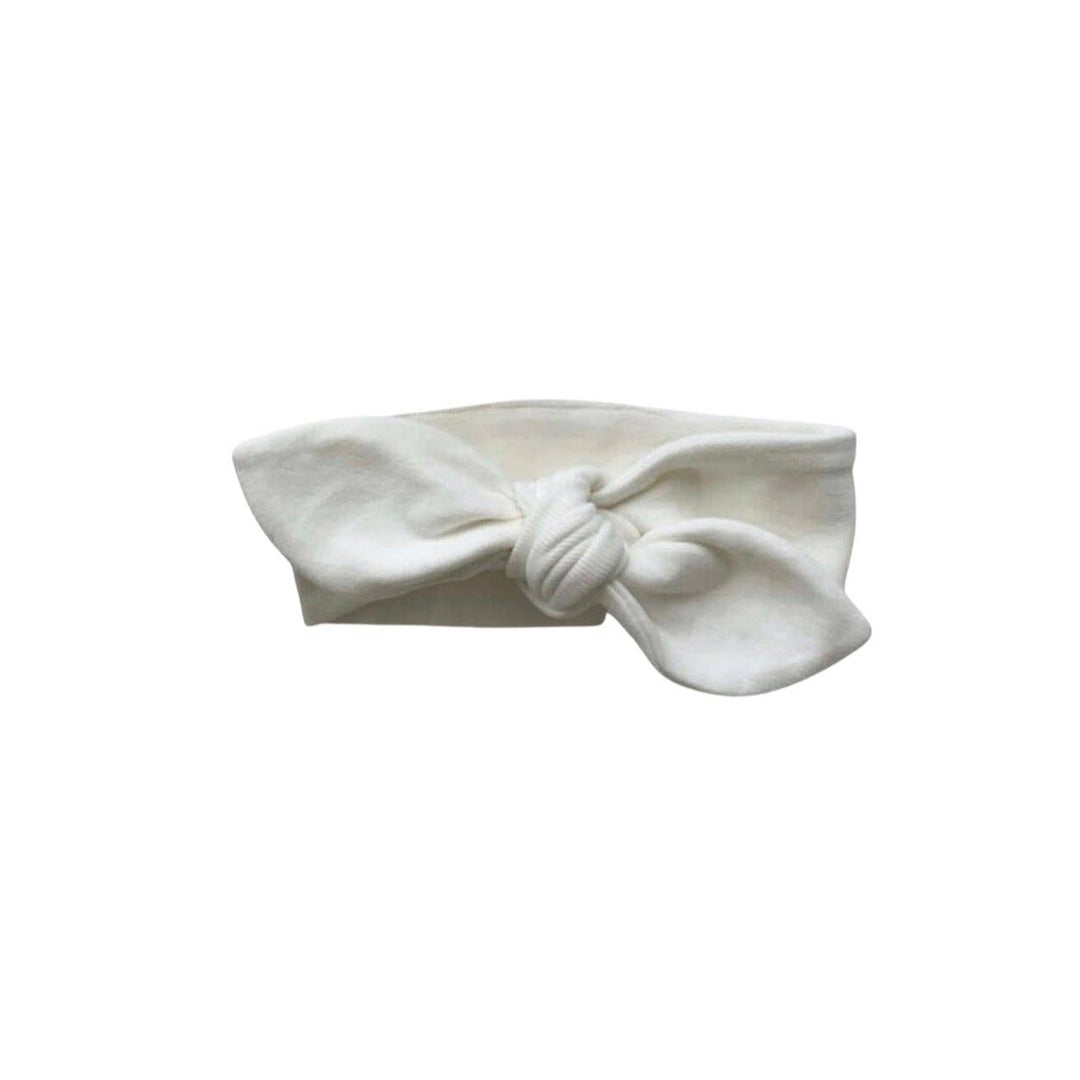 White headband with a bow on a white background