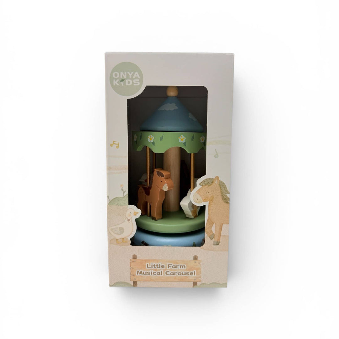 Onya Kids Little Farm Musical Carousel toy in its original packaging, featuring a wooden carousel with a green canopy, brown horse, and beige cow on a white background.